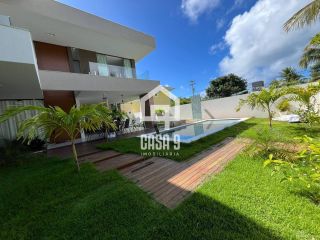 Casa com 5 suítes mobiliada estilo contemporâneo a venda no Condomínio Paraiso em Guarajuba Bahia