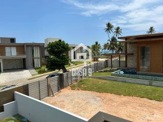 Casa com 6 suítes a venda nunca habitada 150 metros da praia no condomínio Paraiso em Guarajuba Bahia