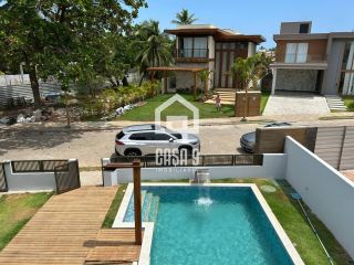 Casa com 6 suítes a venda nunca habitada 150 metros da praia no condomínio Paraiso em Guarajuba Bahia