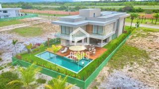 Casa de alto padrão a venda mobiliada com 6 suítes no Alphaville Guarajuba Bahia