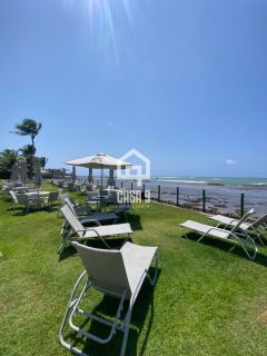 Apartamento a venda com 2 suítes no condomínio Bali Bahia frente mar em Praia do Forte Bahia