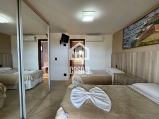 Apartamento a venda com 2 suítes no condomínio Bali Bahia frente mar em Praia do Forte Bahia