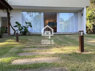Casa a venda mobiliada com 8 suítes no condomínio Quintas das Lagoas com acesso ao mar pela ponte em Itacimirim Bahia