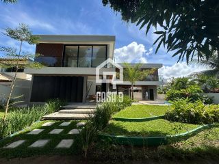 Casa alta padrão a venda mobiliada com 5 suítes em Guarajuba Bahia