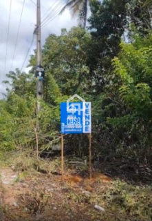Terreno plano na avenida principal do loteamento Mar Azul a venda em Imbassai Bahia