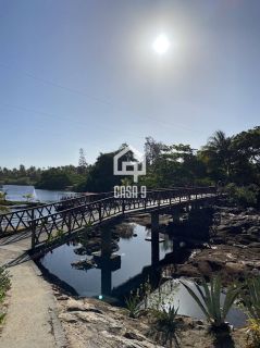 Terreno plano na avenida principal do loteamento Mar Azul a venda em Imbassai Bahia