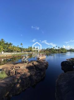 Terreno plano na avenida principal do loteamento Mar Azul a venda em Imbassai Bahia
