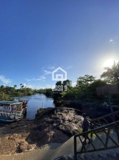Terreno plano na avenida principal do loteamento Mar Azul a venda em Imbassai Bahia
