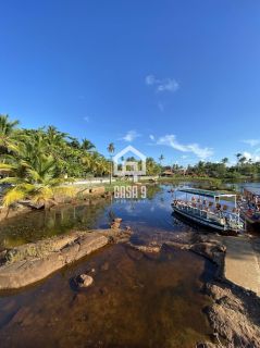 Terreno plano na avenida principal do loteamento Mar Azul a venda em Imbassai Bahia
