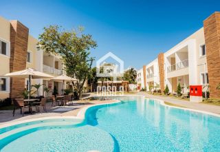 Apartamento novo a venda com 2 quartos e piscina de areia no condomínio Palm Beach em Guarajuba Bahia