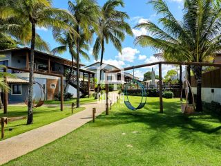 Apartamento superior pé na areia 3 suítes a venda na Praia da Espera em Itacimirim Bahia