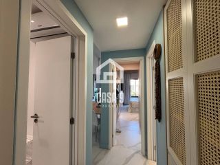 Apartamento mobiliado com 3 quartos pé na areia à venda em Itacimirim Bahia