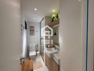 Apartamento mobiliado com 3 quartos pé na areia à venda em Itacimirim Bahia