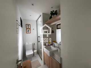 Apartamento mobiliado com 3 quartos pé na areia à venda em Itacimirim Bahia