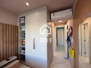 Apartamento mobiliado com 3 quartos pé na areia à venda em Itacimirim Bahia