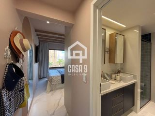 Apartamento mobiliado com 3 quartos pé na areia à venda em Itacimirim Bahia