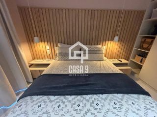 Apartamento mobiliado com 3 quartos pé na areia à venda em Itacimirim Bahia