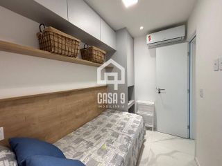 Apartamento mobiliado com 3 quartos pé na areia à venda em Itacimirim Bahia