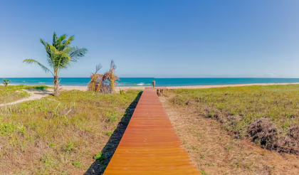 Apartamento mobiliado com 3 quartos pé na areia à venda em Itacimirim Bahia