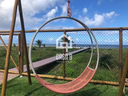 Apartamento mobiliado com 3 quartos pé na areia à venda em Itacimirim Bahia