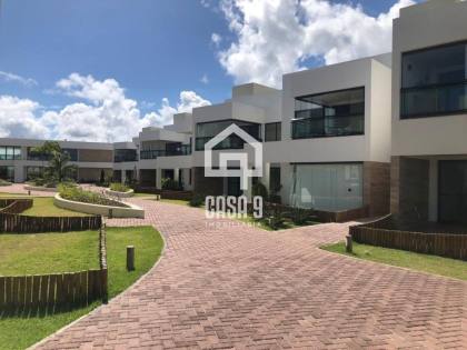 Apartamento mobiliado com 3 quartos pé na areia à venda em Itacimirim Bahia