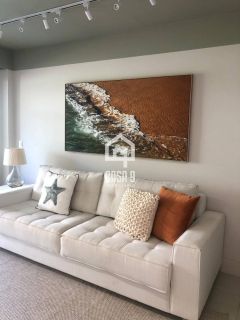 Apartamento térreo mobiliado com 3 quartos pé na areia à venda em Itacimirim Bahia