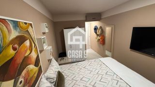 Apartamento térreo mobiliado com 3 quartos pé na areia à venda em Itacimirim Bahia