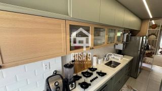 Apartamento térreo mobiliado com 3 quartos pé na areia à venda em Itacimirim Bahia