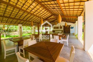 Casa térrea em terreno privativo com 4 suítes para aluguel anual no condomínio Fazenda Praia do Forte Bahia