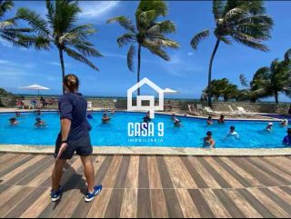 Apartamento duplex com 3 suítes pé na areia e mobiliado a venda em Itacimirim Bahia