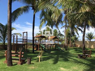 Apartamento duplex com 3 suítes pé na areia e mobiliado a venda no condominio Vilas da Praia em Itacimirim Bahia