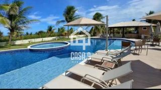 Apartamento térreo mobiliado 02 suítes pé na areia na Praia da Espera em Itacimirim Bahia