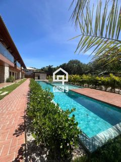 Apartamento superior com varanda novo a venda com 2 suítes em Imbassai Bahia