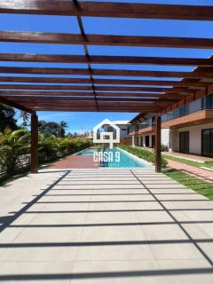 Apartamento superior com varanda novo a venda com 2 suítes em Imbassai Bahia