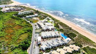 Apartamento garden mobiliado com 3 quartos pé na areia à venda em Itacimirim Bahia
