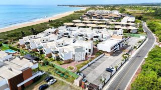 Apartamento garden mobiliado com 3 quartos pé na areia à venda em Itacimirim Bahia