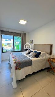 Apartamento garden mobiliado com 3 quartos pé na areia à venda em Itacimirim Bahia