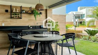 Apartamento garden mobiliado com 3 quartos pé na areia à venda em Itacimirim Bahia