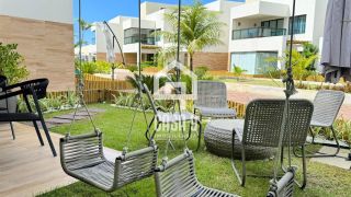 Apartamento garden mobiliado com 3 quartos pé na areia à venda em Itacimirim Bahia
