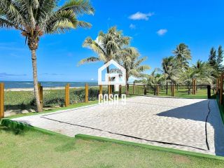 Apartamento térreo nunca habitado pé na areia com 3 suítes a venda no Mamont em Itacimirim Bahia