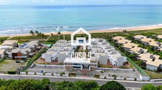 Apartamento garden mobiliado com 3 quartos pé na areia à venda em Itacimirim Bahia