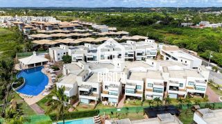 Apartamento garden mobiliado com 3 quartos pé na areia à venda em Itacimirim Bahia