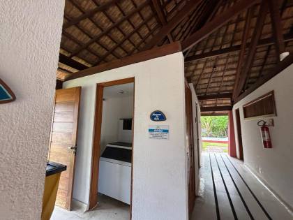 Apartamento térreo a venda com 2 suítes no Village das Acácias Piscinas Naturais Praia do Forte Bahia