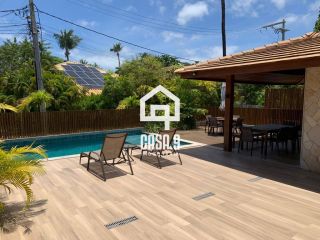 Apartamento térreo em condomínio pé na Areia em Praia do Forte Bahia