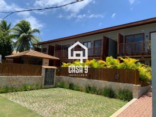 Apartamento térreo em condomínio pé na Areia em Praia do Forte Bahia