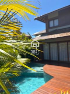Casa com 4 suítes mobiliada pé na areia piscina privativa no condomínio Marlua em Itacimirim Bahia