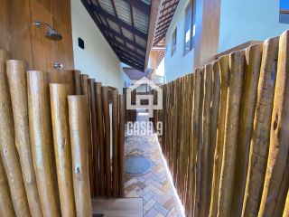 Casa com 4 suítes pé na areia piscina privativa no condomínio Marlua em Itacimirim Bahia