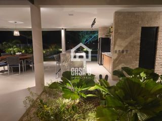 Casa térrea mobiliada com 5 suítes a venda no condomínio Enseada Praia da Espera em Itacimirim Bahia