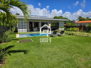 Casa térrea mobiliada com 5 suítes a venda no condomínio Enseada Praia da Espera em Itacimirim Bahia