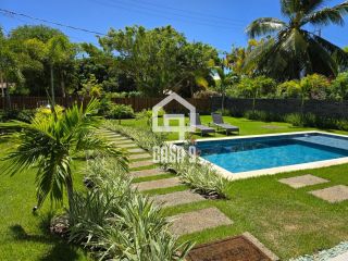 Casa térrea mobiliada com 5 suítes a venda no condomínio Enseada Praia da Espera em Itacimirim Bahia